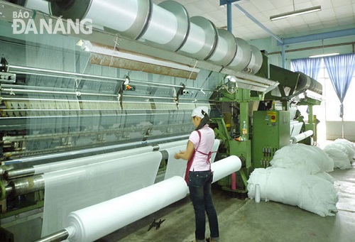A worker at the Hoa Khanh Textile and Garment Company