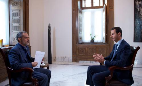 Tổng thống Syria, Bashar Al-Assad đang trả lời phỏng vấn của phóng viên đài truyền hình Iran Khabar, tại thủ đô Damascus, ngày 4-10-2015.  Ảnh: SANA. 
