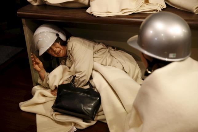 Công tác cứu hộ đang tích cực được triển khai. (Ảnh: Reuters/ Kyodo)