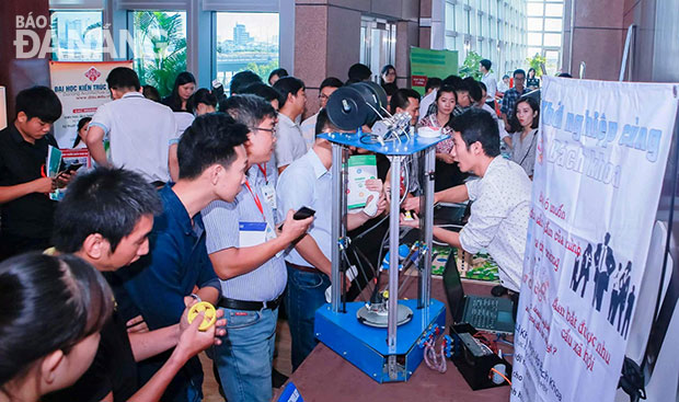 A start-up team displaying their products at a local start-up event
