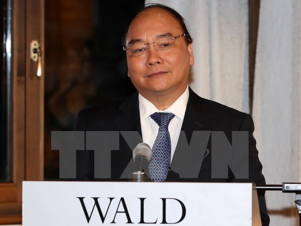 Thủ tướng Nguyễn Xuân Phúc phát biểu tại cuộc gặp Giám đốc điều hành WEF Philipp Roesler và doanh nghiệp thế giới. (Ảnh: Thống Nhất/TTXVN)