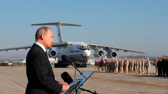 Tổng thống Vladimir Putin phát biểu với quân đội Nga tại Syria.                                 Ảnh: AP