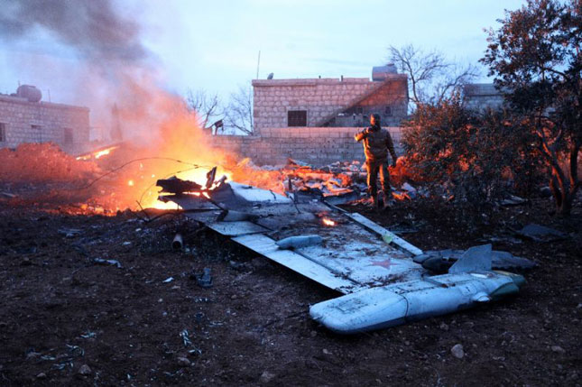 Hiện trường máy bay Su-25 của Nga bị bắn rơi ở tỉnh Idlib.  Ảnh: AFP
