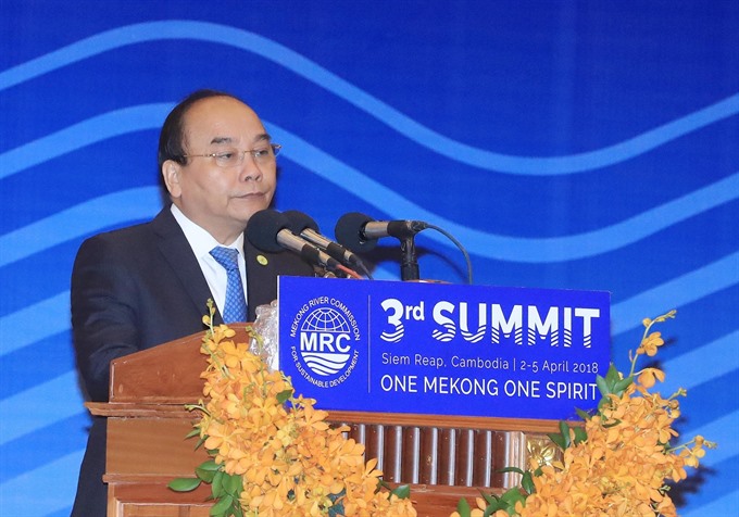 Prime Minister Nguyễn Xuân Phúc gives a speech at the third Mekong River Commission (MRC) Summit in Siem Reap, Cambodia. — VNA/VNS Photo Thống Nhất Read more at http://vietnamnews.vn/politics-laws/425842/pm-attends-third-mekong-river-commission-summit.html#iUO9SHjWiBGMIXj4.99