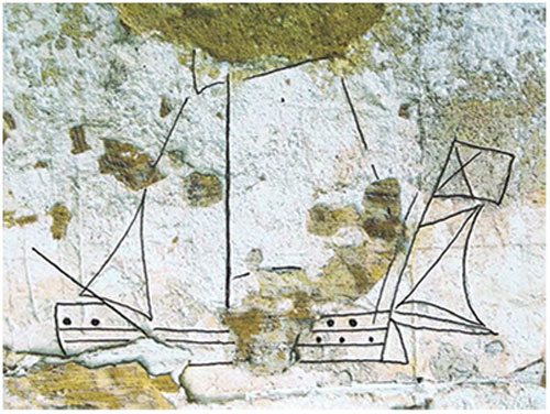 Tranh chạm khắc chiếc tàu thủy trên tường.