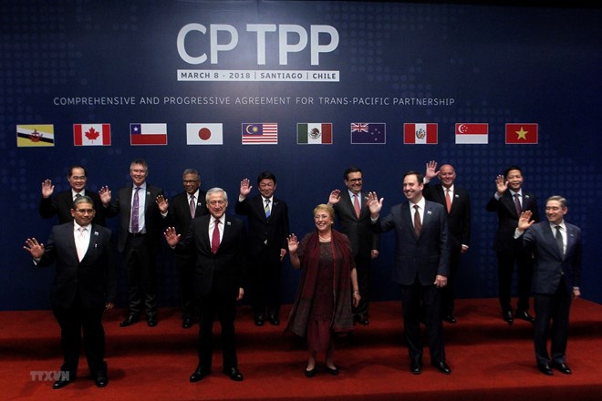 The remaining 11 countries, namely Australia, Brunei, Canada, Chile, Japan, Malaysia, Mexico, New Zealand, Peru, Singapore and Vietnam, signs the pact and rename it the CPTPP in March 2018 in Chile (Photo: VNA)