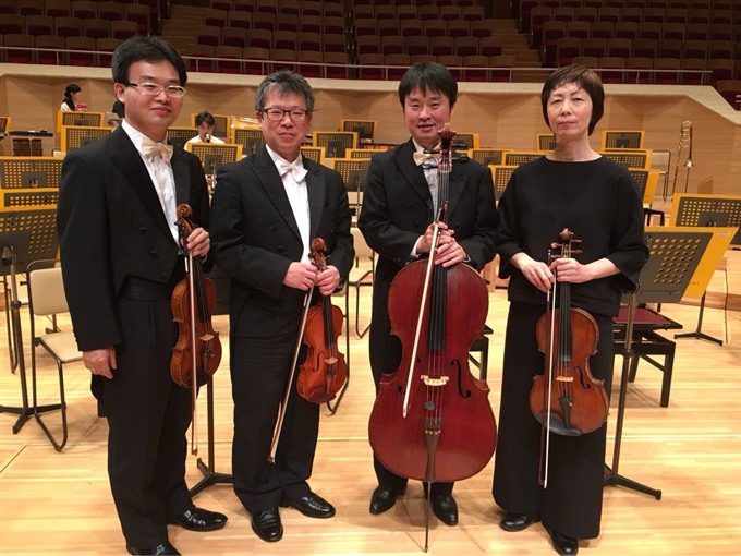 Hitting the right note: Japanese violists Masakazu Saito, Shunichiro Sato, Kumiko Nakagawa and Tetsuya Osawa. — Photo courtesy Tomo Usuda Read more at http://vietnamnews.vn/life-style/449648/japanese-quartet-to-take-the-stage-in-da-nang.html#ShMJXEY7aUsi8ISv.99