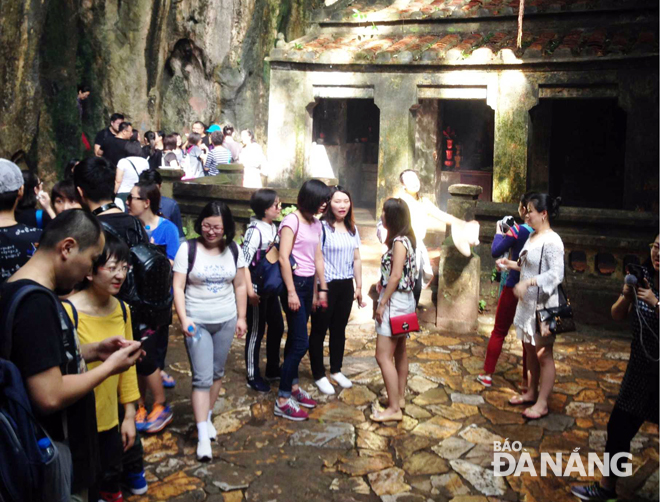Visitors at the Huyen Khong Cave in the Marble Mountains Tourist Area