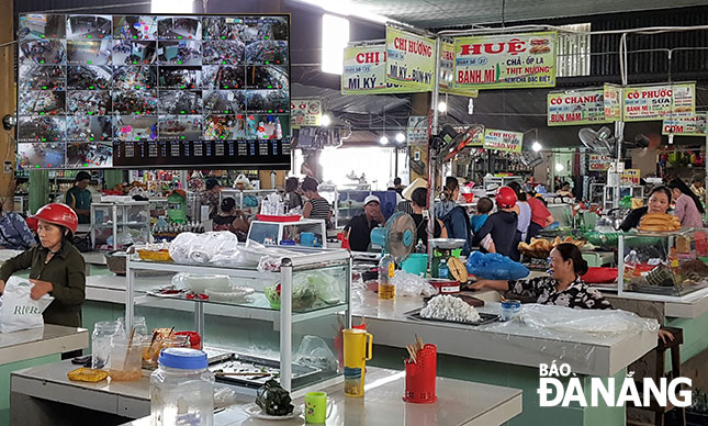 Hệ thống camera (ảnh nhỏ) đã góp phần làm cho việc kinh doanh ở chợ Túy Loan trở nên văn minh, hiện đại hơn. Trong ảnh là một góc khu hàng ẩm thực tại chợ. 