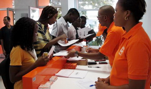 Customers registering for the Movitel mobile phone service, an investment of Viet Nam-based Viettel in Maputo, the capital of Mozambique