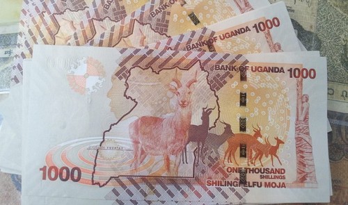 A stack of Ugandan banknotes