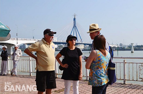  Foreign visitors on the Bach Dang pedestrian promenade