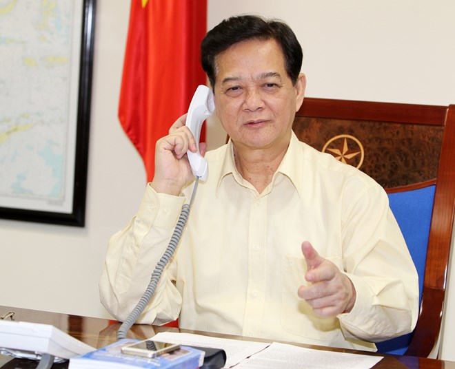 Thủ tướng Nguyễn Tấn Dũng điện đàm tại trụ sở Chính phủ.