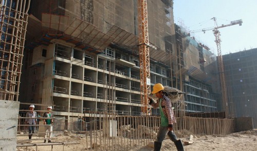 Workers are seen at a construction site of a Vietnamese-invested apartment project in Myanmar. Tuoi Tre
