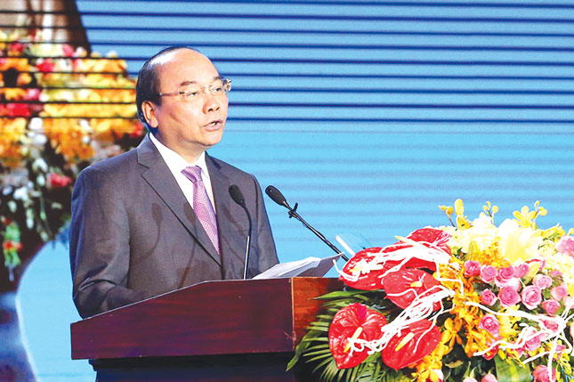 Thủ tướng Nguyễn Xuân Phúc phát biểu tại lễ kỷ niệm 20 năm Đà Nẵng trở thành thành phố trực thuộc Trung ương (1-1-1997 - 1-1-2017).Ảnh: Văn Nở