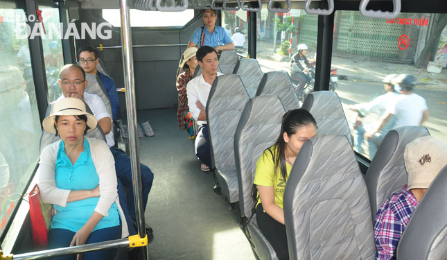 Passengers on board a subsidised intra-city bus