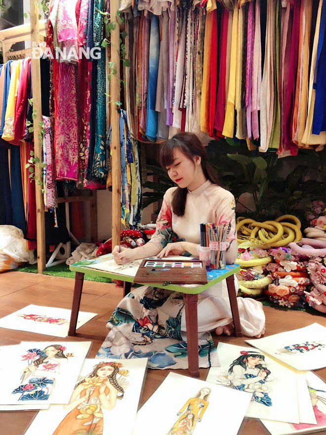 The owner of the My Color ‘ao dai’ shop, Ms Do Thi Quynh Nhi.