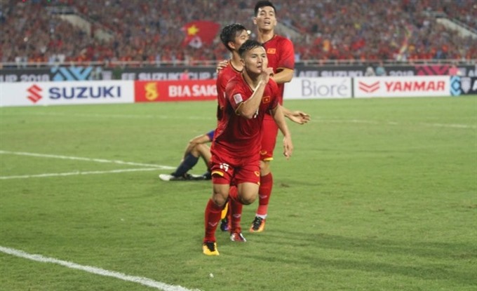Vietnamese midfielder Nguyễn Quang Hải celebrates a goal. — Photo vov.vn Read more at http://vietnamnews.vn/sports/481699/hai-nominated-asias-best-footballer-award.html#fo9yOZAKK2Z9jdu5.99