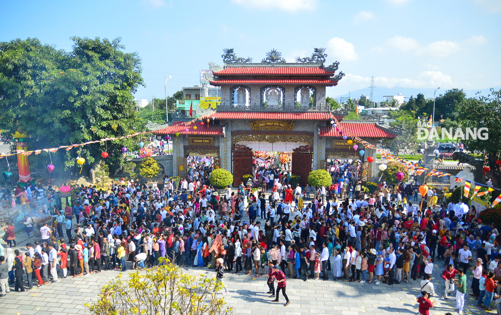 A local pagoda is crowded with people…