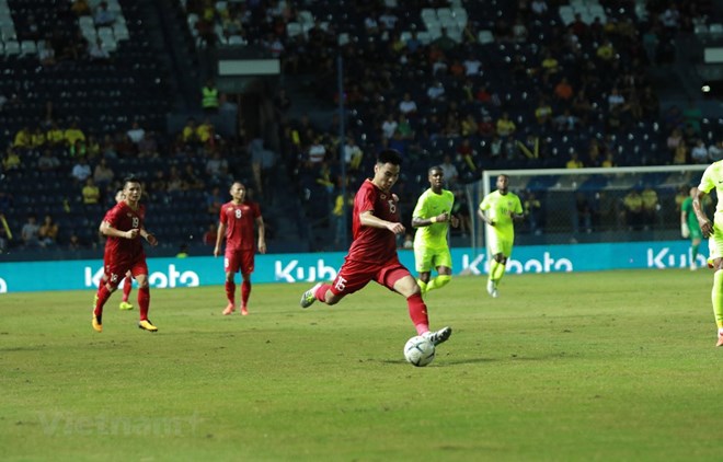 Midfielder Duc Huy (No. 15) equalised for Viet Nam at the 83rd minute (Photo: VNA)