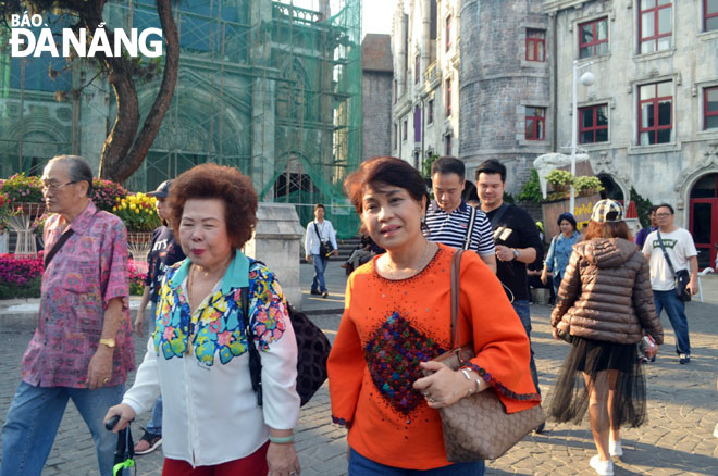 Tourists are seen visiting the popular Sun World Ba Na Hills