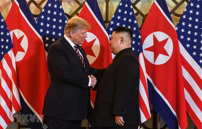 US President Donald Trump and DPRK leader Kim Jong Un meet at their summit held in Hanoi in February. (Photo: VNA)