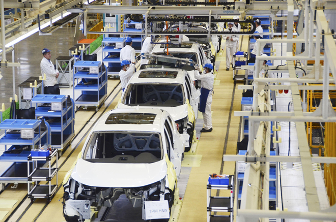 Các chuyên gia IMF lo ngại nCoV ảnh hưởng đến kinh tế Nhật Bản.  Trong ảnh: Nhà máy sản xuất ô-tô của Công ty Honda Motor (Nhật Bản) tại thành phố Vũ Hán (tỉnh Hồ Bắc, Trung Quốc) hồi tháng 4-2019. 