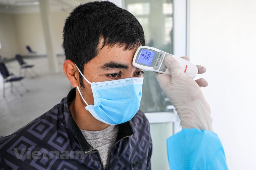 Ngoài ra còn có khu đo thân nhiệt, khai báo y tế trước khi thực hiện test nhanh. (Ảnh: Tùng Lâm/Vietnam+)