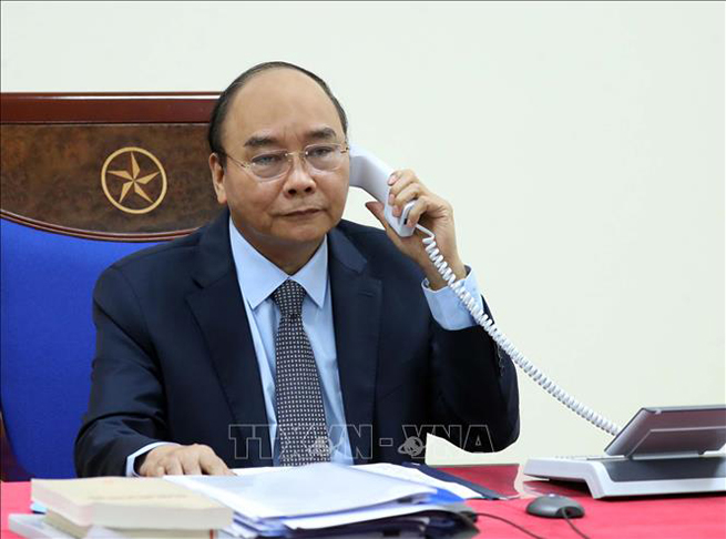  Thủ tướng Nguyễn Xuân Phúc điện đàm với Thủ tướng Chính phủ Liên bang Nga Mikhail Mishustin. Ảnh: Thống Nhất/TTXVN.