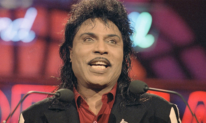 Hình ảnh ca sĩ Little Richard biểu diễn trong thập niên 1990. Ảnh: WTKR