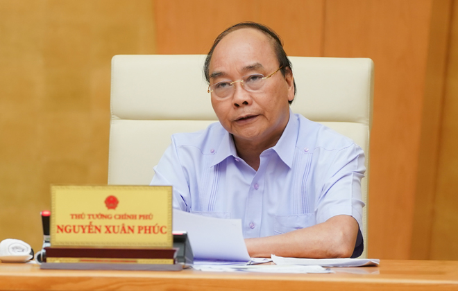 Thủ tướng Nguyễn Xuân Phúc phát biểu tại cuộc họp.  Ảnh: VGP