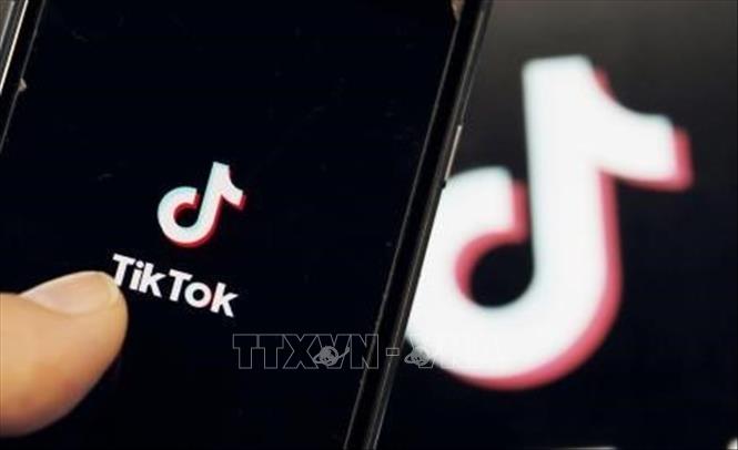  Biểu tượng TikTok trên màn hình điện thoại. Ảnh: Kyodo/TTXVN