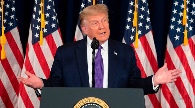 Tổng thống Donald Trump cho rằng, số ca tử vong do Covid-19 ở Mỹ sẽ tăng cao hơn con số 200.000 người nếu chính phủ của ông không hành động. 						            Ảnh: AFP/Getty Images