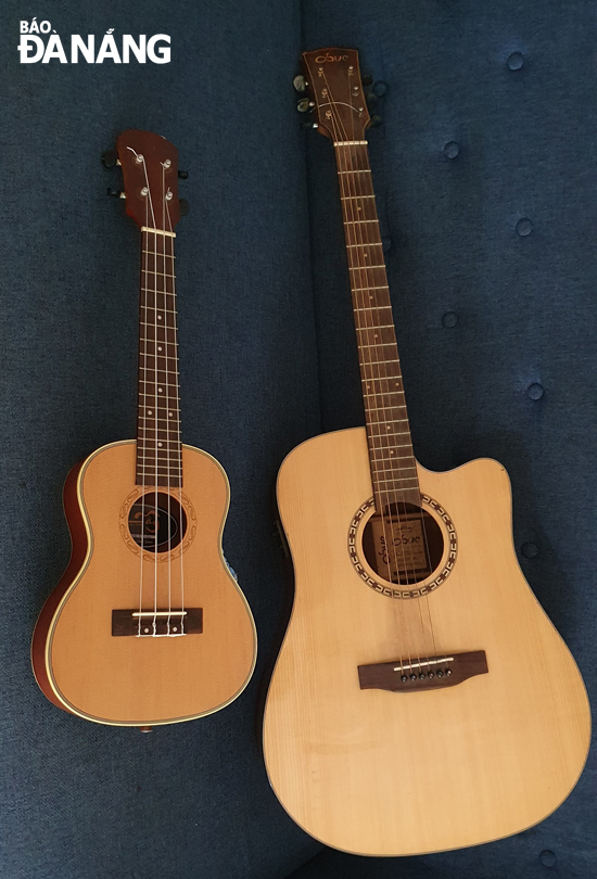 Concert Ukulele (trái) và guitar. Ảnh: V.T.L
