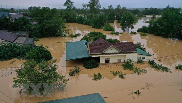 Currently, inundation is hitting about 154,000 households in Ha Tinh, Quang Binh and Quang Tri. (Photo: VNA)