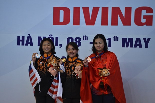 Những vận động viên đầu tiên trên bục nhận huy chương tại SEA Games 31. (Ảnh: PV/Vietnam+)