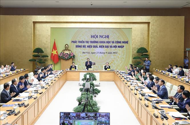 Thủ tướng Phạm Minh Chính và các đại biểu dự Hội nghị phát triển thị trường khoa học và công nghệ, chiều 23/9/2022. Ảnh: Dương Giang/TTXVN