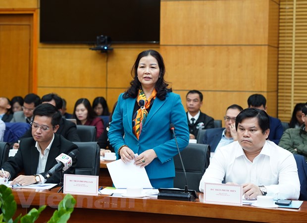 Bà Trần Thị Phương Lan, Quyền Giám đốc Sở Công Thương Hà Nội phát biểu tại hội nghị. (Ảnh: Xuân Quảng/Vietnam+)