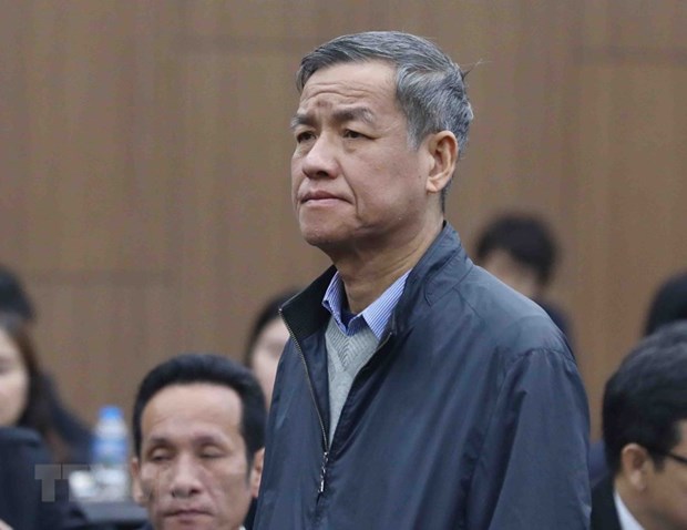 Bị cáo Đinh Quốc Thái, cựu Chủ tịch Ủy ban Nhân dân tỉnh Đồng Nai, nghe chủ tọa tuyên án. (Ảnh: Phạm Kiên/TTXVN)