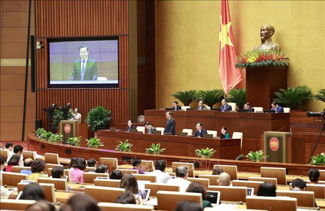 Phó Thủ tướng Chính phủ Lê Minh Khái phát biểu tại phiên chất vấn và trả lời chất vấn sáng 8/6. Ảnh: TTXVN